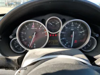 2006 Mazda MX-5 Miata Touring z VIN JM1NC25F360110572, wystawiony jako Copart lot #50555765 z przebiegiem 166 785 mil mil oraz Czysty tytuł • Clean title. Historia ofert i sprzedaży dostępna na DreamBid. Obrazek 9.