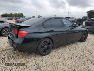 2014 BMW 3 Series 335i with VIN WBA3A9G50ENR97346, listed as a Copart auction lot 51035095 with 104,565 mi miles and Salvage Title. Bid and sale history available at carsss.com. Image 3.