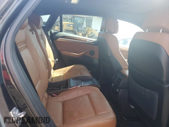 2012 BMW X6 50i z VIN 5UXFG8C59CLZ97030, wystawiony jako Copart lot #53632795 z przebiegiem 109 933 mil mil oraz Czysty tytuł • Clean title. Historia ofert i sprzedaży dostępna na DreamBid. Obrazek 11.