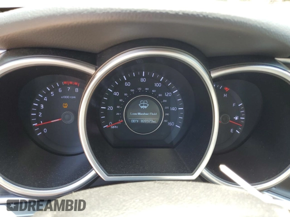 2015 Kia Optima LX z VIN KNAGM4A70F5619499, wystawiony jako Copart lot #60094465 z przebiegiem 169 373 mil mil oraz Szkoda całkowita • Salvage title. Historia ofert i sprzedaży dostępna na DreamBid. Obrazek 9.