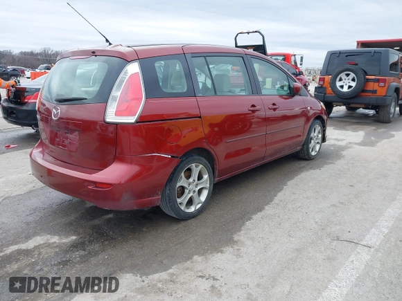 2009 Mazda Mazda5 Sport with VIN JM1CR293X90339440, listed as a IAAI auction lot 41525453 with 173,640 mi miles. Bid and sale history available at carsss.com. Image 4.