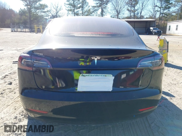 2019 Tesla Model 3 Mid Range with VIN 5YJ3E1EA2KF306286, listed as a IAAI auction lot 41699127 with 56,249 mi miles and . Bid and sale history available at DreamBid. Image 16.