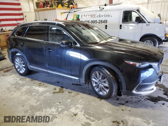 2021 Mazda CX-9 Grand Touring with VIN JM3TCBDY5M0512429, listed as a Copart auction lot 44445625 with 64,989 mi miles and Salvage title. Bid and sale history available at DreamBid. Image 4.