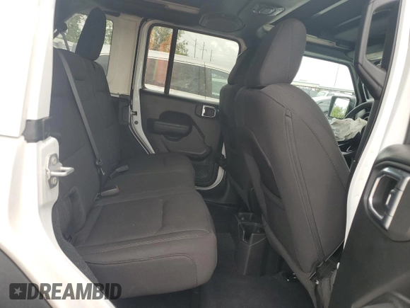 2023 Jeep Wrangler Willys with VIN 1C4HJXDN8PW625204, listed as a Copart auction lot 59328065 with 18,116 mi miles and Salvage title. Bid and sale history available at DreamBid. Image 10.