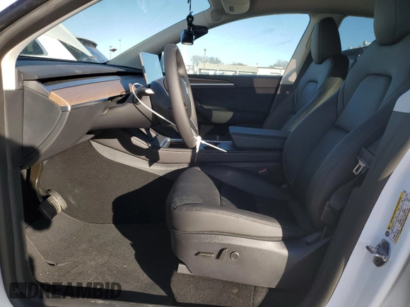 2025 Tesla Model Y Long Range with VIN 7SAYGDEDXSF228371, listed as a Copart auction lot 43925575 with 2,848 mi miles and Salvage Title. Bid and sale history available at DreamBid. Image 7.