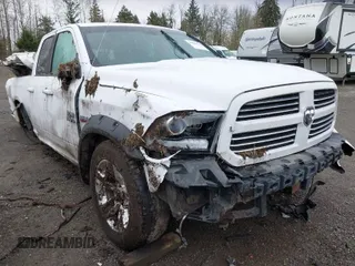 2014 Ram 1500 Sport z VIN 1C6RR7HT4ES218384, wystawiony jako IAAI lot #41899114 z przebiegiem 140 734 mil mil oraz . Historia ofert i sprzedaży dostępna na DreamBid. Obrazek 1.