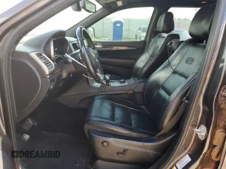 2015 Jeep Grand Cherokee Overland with VIN 1C4RJFCT4FC813510, listed as a Copart auction lot 41466395 with 135,124 mi miles and Salvage Title. Bid and sale history available at carsss.com. Image 7.