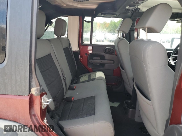 2010 Jeep Wrangler Unlimited Rubicon with VIN 1J4BA6H14AL115460, listed as a Copart auction lot 58349925 with Not provided miles and Salvage title. Bid and sale history available at DreamBid. Image 11.