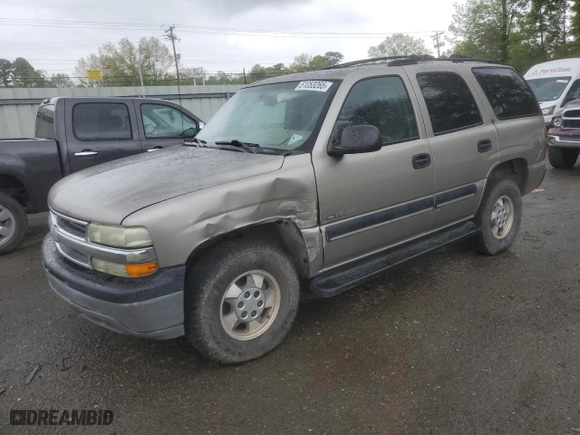 2001 Chevrolet Tahoe LT with VIN 1GNEC13T51R197521, listed as a Copart auction lot 51053265 with 319,590 mi miles and Salvage Title. Bid and sale history available at carsss.com. Image 1.