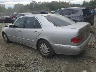 2001 Mercedes-Benz E-Class with VIN WDBJF65J71B201020, listed as a Copart auction lot 76067154 with 328,629 mi miles and Salvage Title. Bid and sale history available at carsss.com. Image 2.
