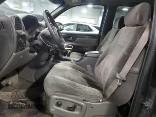2004 GMC Envoy SLT with VIN 1GKDT13S642191868, listed as a Copart auction lot 82334304 with 150,810 mi miles and Salvage Title. Bid and sale history available at carsss.com. Image 7.