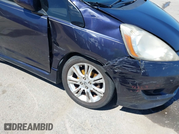 2009 Honda Fit Sport with VIN JHMGE88479S007307, listed as a IAAI auction lot 41801827 with 212,998 mi miles. Bid and sale history available at carsss.com. Image 6.