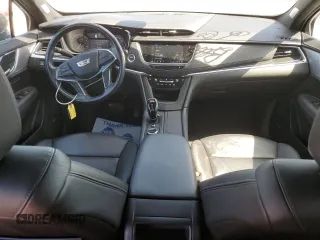 2023 Cadillac XT5 FWD Premium Luxury with VIN 1GYKNCRS6PZ171335, listed as a Copart auction lot 51859385 with 52,691 mi miles and Clean Title. Bid and sale history available at carsss.com. Image 8.