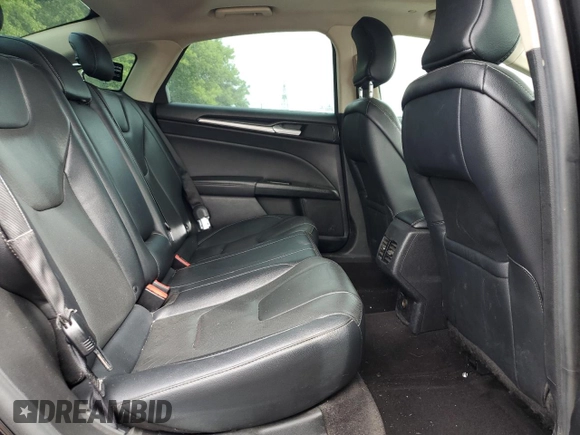 2019 Ford Fusion Titanium z VIN 3FA6P0RU4KR211674, wystawiony jako Copart lot #62205885 z przebiegiem 313 261 mil mil oraz Szkoda całkowita • Salvage title. Historia ofert i sprzedaży dostępna na DreamBid. Obrazek 10.