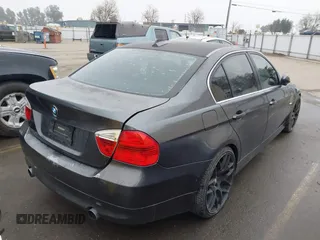 2007 BMW 3 Series 335i with VIN WBAVB73527PA87305, listed as a IAAI auction lot 41277204 with 107,699 mi miles. Bid and sale history available at carsss.com. Image 4.