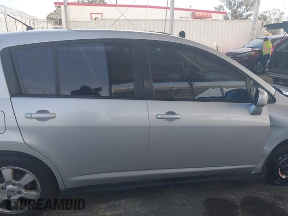 2009 Nissan Versa 1.8 SL with VIN 3N1BC13E29L406619, listed as a IAAI auction lot 41761728 with 115,510 mi miles. Bid and sale history available at carsss.com. Image 14.