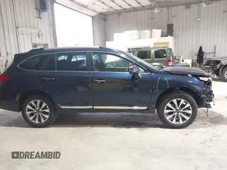 2018 Subaru Outback Touring with VIN 4S4BSATC2J3225238, listed as a IAAI auction lot 42505972 with 152,013 mi miles and . Bid and sale history available at DreamBid. Image 14.
