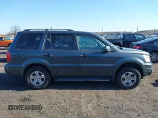 2003 Honda Pilot EX z VIN 2HKYF18543H589150, wystawiony jako IAAI lot #41836213 z przebiegiem 248 104 mil mil oraz . Historia ofert i sprzedaży dostępna na DreamBid. Obrazek 13.