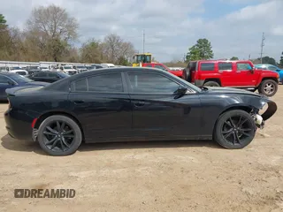 2017 Dodge Charger SXT with VIN 2C3CDXHG4HH643233, listed as a IAAI auction lot 41806195 with 92,318 mi miles and . Bid and sale history available at DreamBid. Image 14.