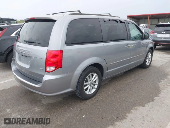 2014 Dodge Grand Caravan SXT with VIN 2C4RDGCG0ER417662, listed as a IAAI auction lot 41933279 with 156,751 mi miles and . Bid and sale history available at DreamBid. Image 4.