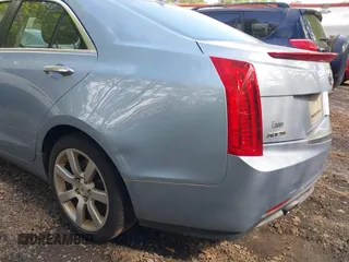 2013 Cadillac ATS with VIN 1G6AA5RA7D0141165, listed as a IAAI auction lot 42146986 with 127,688 mi miles and . Bid and sale history available at DreamBid. Image 6.