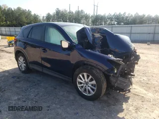 2013 Mazda CX-5 Touring with VIN JM3KE2CE0D0142102, listed as a Copart auction lot 51223575 with Not Provided miles and Salvage Title. Bid and sale history available at DreamBid. Image 4.