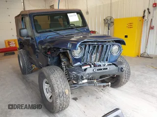 2003 Jeep Wrangler Sport with VIN 1J4FA49S53P311822, listed as a IAAI auction lot 41621710 with 156,023 mi miles. Bid and sale history available at carsss.com. Image 1.