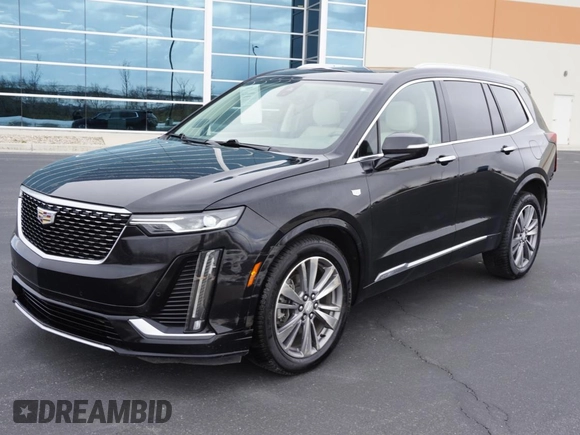 2021 Cadillac XT6 Premium Luxury z VIN 1GYKPDRS3MZ113033, wystawiony jako Copart lot #50076845 z przebiegiem 104 248 mil mil oraz Szkody całkowita. Historia ofert i sprzedaży dostępna na DreamBid. Obrazek 2.