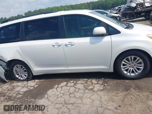 2015 Toyota Sienna XLE with VIN 5TDYK3DC5FS613045, listed as a IAAI auction lot 42276147 with 108,271 mi miles and . Bid and sale history available at DreamBid. Image 13.