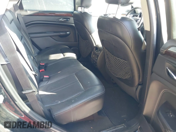 2014 Cadillac SRX Premium Collection z VIN 3GYFNDE34ES581728, wystawiony jako IAAI lot #41578226 z przebiegiem 121 118 mil mil oraz . Historia ofert i sprzedaży dostępna na DreamBid. Obrazek 8.