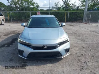 2023 Honda Civic Touring with VIN 2HGFE1F91PH305053, listed as a IAAI auction lot 42378311 with 41,576 mi miles and . Bid and sale history available at DreamBid. Image 13.