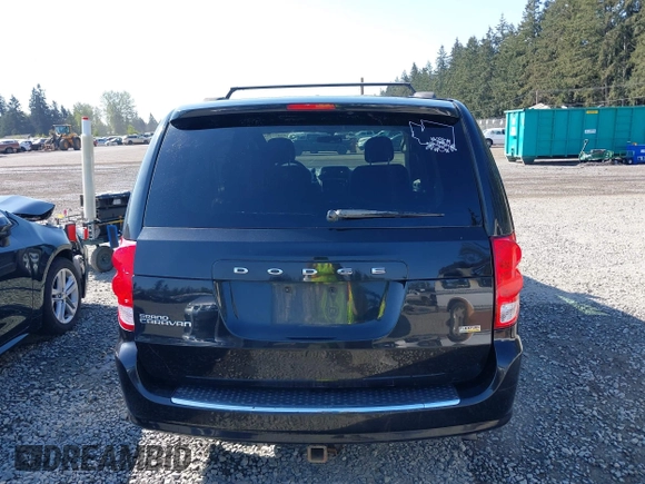 2012 Dodge Grand Caravan SXT with VIN 2C4RDGCG2CR319651, listed as a IAAI auction lot 42097594 with 155,521 mi miles and . Bid and sale history available at DreamBid. Image 16.