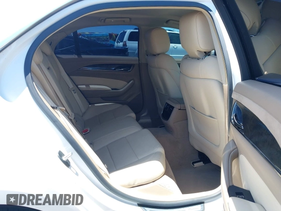 2015 Cadillac CTS Luxury RWD with VIN 1G6AR5SX7F0106703, listed as a IAAI auction lot 42607622 with 79,539 mi miles and . Bid and sale history available at DreamBid. Image 8.