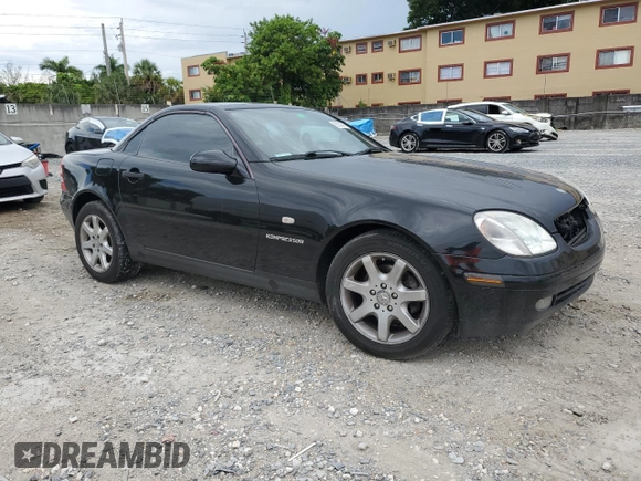 2000 Mercedes-Benz SLK 230 Kompressor with VIN WDBKK47F0YF149827, listed as a Copart auction lot 62524515 with 62,005 mi miles and Salvage title. Bid and sale history available at DreamBid. Image 4.