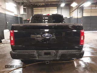 2023 Ford F-150 XL with VIN 1FTFW1E5XPKE80999, listed as a IAAI auction lot 41596993 with 33,285 mi miles. Bid and sale history available at carsss.com. Image 17.