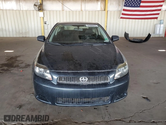 2005 Scion tC with VIN JTKDE177950027533, listed as a Copart auction lot 54366975 with 179,693 mi miles and Salvage Title. Bid and sale history available at carsss.com. Image 5.