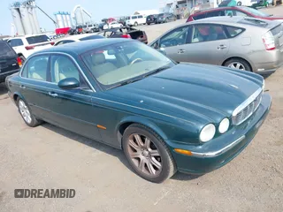 2005 Jaguar XJ 8 LWB with VIN SAJWA79C95SG46067, listed as a IAAI auction lot 42815346 with 130,851 mi miles and . Bid and sale history available at DreamBid. Image 1.