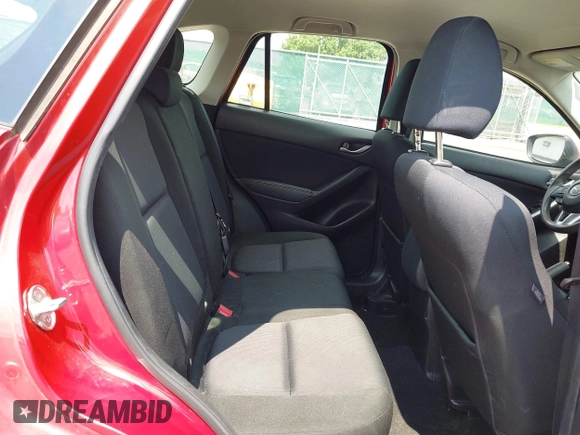 2015 Mazda CX-5 Sport with VIN JM3KE4BY5F0502121, listed as a IAAI auction lot 42652276 with 192,462 mi miles and . Bid and sale history available at DreamBid. Image 8.