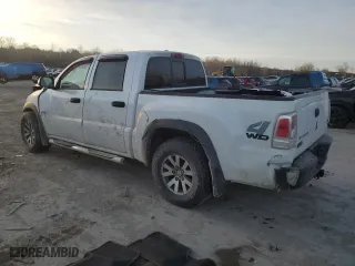 2006 Mitsubishi Raider Duro Cross with VIN 1Z7HT38N36S579031, listed as a Copart auction lot 87695435 with 117,098 mi miles and Salvage Title. Bid and sale history available at carsss.com. Image 2.