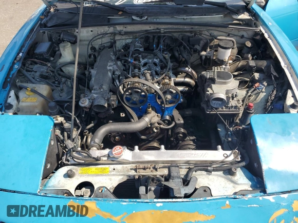 1990 Mazda MX-5 Miata z VIN JM1NA3515L0116370, wystawiony jako Copart lot #62568904 z przebiegiem 175 230 mil mil oraz Szkoda całkowita • Salvage title. Historia ofert i sprzedaży dostępna na DreamBid. Obrazek 11.