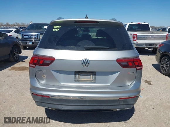 2019 Volkswagen Tiguan SEL Premium with VIN 3VV4B7AX5KM085435, listed as a IAAI auction lot 41839386 with 124,501 mi miles and . Bid and sale history available at DreamBid. Image 16.
