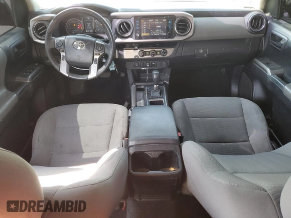 2018 Toyota Tacoma SR5 z VIN 3TMAZ5CN8JM077857, wystawiony jako Copart lot #52570945 z przebiegiem 50 182 mil mil oraz Szkoda całkowita • Salvage title. Historia ofert i sprzedaży dostępna na DreamBid. Obrazek 8.