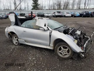 1997 Mitsubishi Eclipse GS with VIN 4A3AX35G5VE160888, listed as a Copart auction lot 80085414 with 163,683 mi miles and Salvage Title. Bid and sale history available at carsss.com. Image 4.