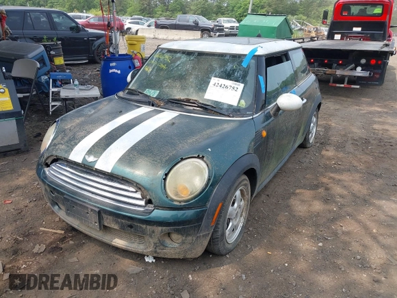 2010 MINI Hardtop with VIN WMWMF3C57ATZ24618, listed as a IAAI auction lot 42426752 with 68,973 mi miles and . Bid and sale history available at DreamBid. Image 2.
