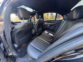 2018 Mercedes-Benz E with VIN WDDZF4KB1JA363906, listed as a Copart auction lot 55195515 with 141,675 mi miles and Clean Title. Bid and sale history available at carsss.com. Image 6.
