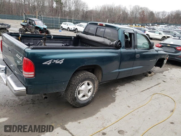 1997 Dodge Dakota z VIN 1B7GG23XXVS260724, wystawiony jako Copart lot #81040004 z przebiegiem Nie podano mil oraz Szkoda całkowita • Salvage title. Historia ofert i sprzedaży dostępna na DreamBid. Obrazek 3.