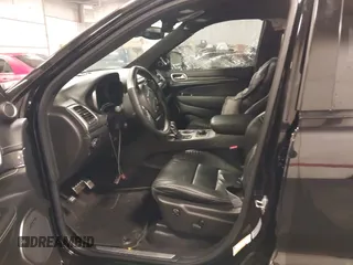 2017 Jeep Grand Cherokee SRT with VIN 1C4RJFDJ9HC739324, listed as a IAAI auction lot 40898998 with 92,547 mi miles. Bid and sale history available at carsss.com. Image 5.