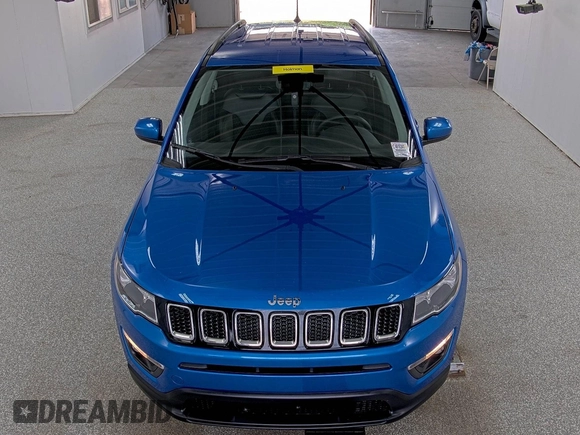 2021 Jeep Compass Latitude z VIN 3C4NJDBB0MT594087, wystawiony jako IAAI lot #42791550 z przebiegiem 78 385 mil mil oraz . Historia ofert i sprzedaży dostępna na DreamBid. Obrazek 4.