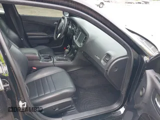 2014 Dodge Charger RT Plus with VIN 2C3CDXDT6EH187041, listed as a IAAI auction lot 39443589 with 62,981 mi miles. Bid and sale history available at carsss.com. Image 5.
