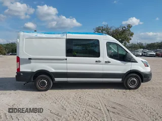 2021 Ford Transit Cargo with VIN 1FTBR1C85MKA19997, listed as a IAAI auction lot 41431285 with 61,158 mi miles and . Bid and sale history available at DreamBid. Image 13.